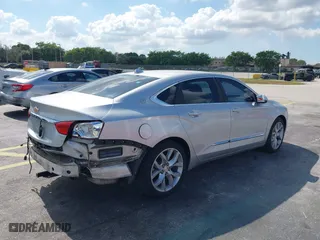 2014 Chevrolet Impala LTZ with VIN 2G1145SL2E9213986, listed as a IAAI auction lot 41526798 with 202,836 mi miles. Bid and sale history available at carsss.com. Image 4.