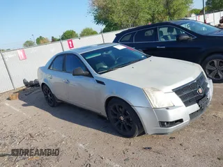 2009 Cadillac CTS AWD z VIN 1G6DG577X90115038, wystawiony jako IAAI lot #42176902 z przebiegiem 320 982 mil mil oraz . Historia ofert i sprzedaży dostępna na DreamBid. Obrazek 1.