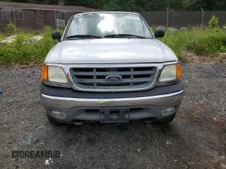 2004 Ford F-150 with VIN 2FTRF08294CA16417, listed as a Copart auction lot 58192935 with 233,414 mi miles and Salvage title. Bid and sale history available at DreamBid. Image 5.