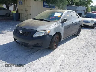 2009 Toyota Corolla z VIN JTDBL40E599028162, wystawiony jako IAAI lot #42350447 z przebiegiem 193 848 mil mil oraz . Historia ofert i sprzedaży dostępna na DreamBid. Obrazek 2.