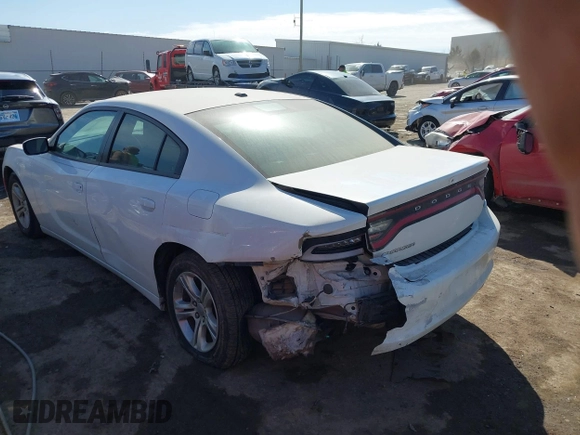 2021 Dodge Charger SXT with VIN 2C3CDXBG5MH605867, listed as a IAAI auction lot 41682336 with 56,660 mi miles and . Bid and sale history available at DreamBid. Image 14.