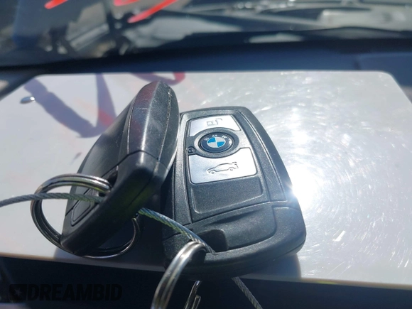 2014 BMW 3 Series 328i with VIN WBA3C1C57EK116483, listed as a IAAI auction lot 42697759 with 113,010 mi miles and . Bid and sale history available at DreamBid. Image 11.