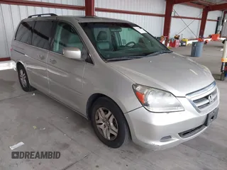 2005 Honda Odyssey EX-L with VIN 5FNRL38615B026205, listed as a IAAI auction lot 42128729 with 172,260 mi miles. Bid and sale history available at carsss.com. Image 1.