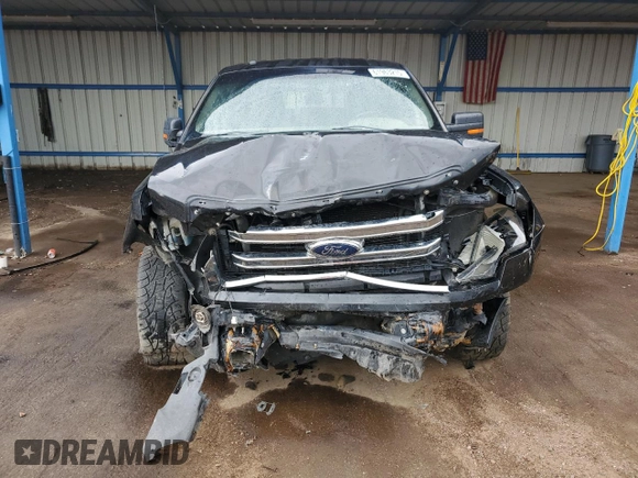 2013 Ford F-150 XL with VIN 1FTFW1EF8DFA21791, listed as a Copart auction lot 61963215 with 128,161 mi miles and Salvage title. Bid and sale history available at DreamBid. Image 5.