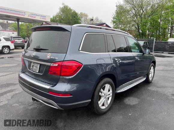 2013 Mercedes-Benz GL 450 z VIN 4JGDF7CE1DA247796, wystawiony jako Copart lot #59948105 z przebiegiem 133 542 mil mil oraz Czysty tytuł • Clean title. Historia ofert i sprzedaży dostępna na DreamBid. Obrazek 4.