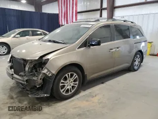 2013 Honda Odyssey EX-L with VIN 5FNRL5H68DB074276, listed as a Copart auction lot 50323735 with 154,620 mi miles and Salvage Title. Bid and sale history available at carsss.com. Image 1.
