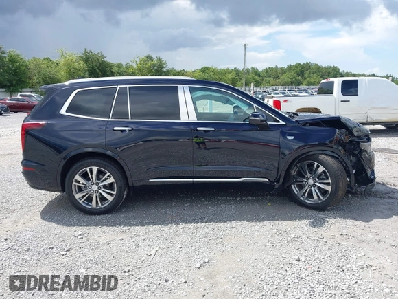 2022 Cadillac XT6 Premium Luxury with VIN 1GYKPCRS4NZ145145, listed as a IAAI auction lot 42533642 with 36,450 mi miles and . Bid and sale history available at DreamBid. Image 13.