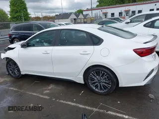 2023 Kia Forte GT-Line z VIN 3KPF54AD5PE583428, wystawiony jako IAAI lot #42016122 z przebiegiem 16 589 mil mil oraz . Historia ofert i sprzedaży dostępna na DreamBid. Obrazek 14.