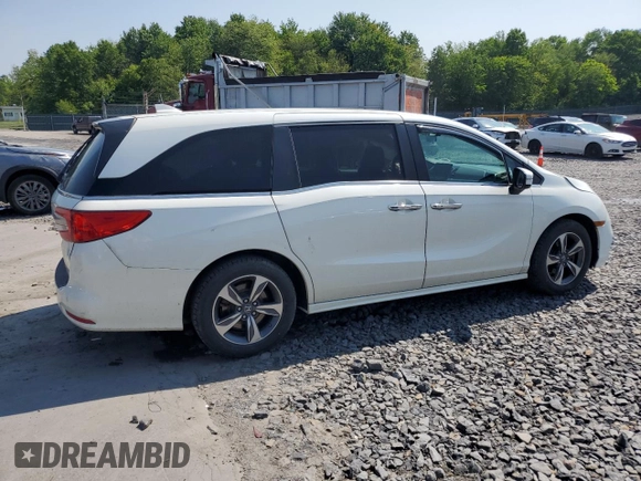 2019 Honda Odyssey Touring with VIN 5FNRL6H81KB051846, listed as a Copart auction lot 58723015 with 68,142 mi miles and Salvage title. Bid and sale history available at DreamBid. Image 3.