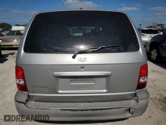 2003 Kia Sedona LX with VIN KNDUP131236453481, listed as a Copart auction lot 75660244 with 125,628 mi miles and Salvage Title. Bid and sale history available at carsss.com. Image 6.