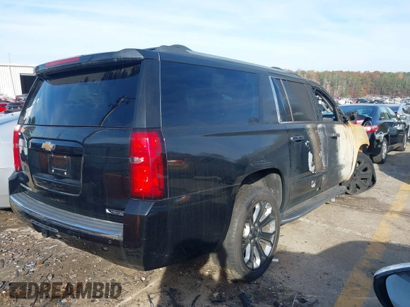 2017 Chevrolet Suburban Premier with VIN 1GNSKJKC6HR225604, listed as a IAAI auction lot 40962301 with Not Provided miles and . Bid and sale history available at DreamBid. Image 4.