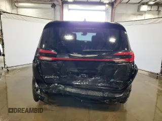 2023 Chrysler Pacifica Hybrid Limited with VIN 2C4RC1S75PR626237, listed as a Copart auction lot 60257305 with 61,864 mi miles and Salvage title. Bid and sale history available at DreamBid. Image 6.