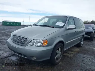 2004 Kia Sedona LX with VIN KNDUP131246567448, listed as a IAAI auction lot 41842992 with 231,424 mi miles. Bid and sale history available at carsss.com. Image 2.