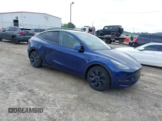 2024 Tesla Model Y Long Range z VIN 7SAYGAEE4RF161266, wystawiony jako IAAI lot #42108995 z przebiegiem 5 194 mil mil oraz . Historia ofert i sprzedaży dostępna na DreamBid. Obrazek 1.