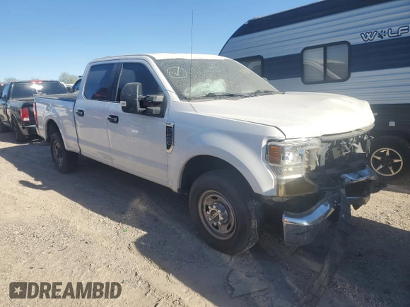 2020 Ford F-250 XL with VIN 1FT7W2A64LEC12385, listed as a Copart auction lot 77958334 with 122,635 mi miles and Salvage title. Bid and sale history available at DreamBid. Image 4.