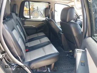 2007 Ford Explorer Sport Trac Limited z VIN 1FMEU538X7UA12888, wystawiony jako IAAI lot #42252655 z przebiegiem 129 680 mil mil oraz . Historia ofert i sprzedaży dostępna na DreamBid. Obrazek 8.