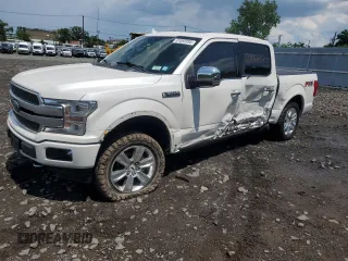 2018 Ford F-150 XL with VIN 1FTEW1EG5JFD66096, listed as a Copart auction lot 61892095 with 56,964 mi miles and Salvage title. Bid and sale history available at DreamBid. Image 1.
