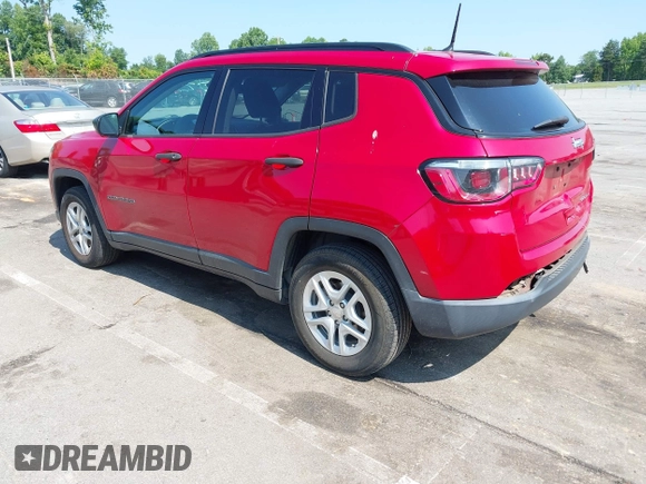 2018 Jeep Compass Sport with VIN 3C4NJCABXJT308768, listed as a IAAI auction lot 42420499 with 84,285 mi miles and . Bid and sale history available at DreamBid. Image 3.