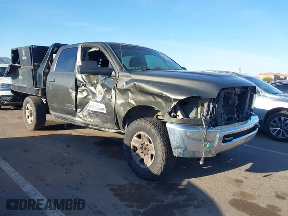 2012 Ram 2500 ST z VIN 3C6TD5CT6CG290580, wystawiony jako IAAI lot #41755239 z przebiegiem 207 282 mil mil oraz . Historia ofert i sprzedaży dostępna na DreamBid. Obrazek 1.