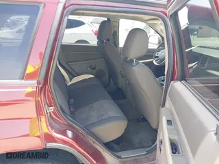2009 Jeep Grand Cherokee Laredo with VIN 1J8GS48K39C521160, listed as a IAAI auction lot 42039577 with 262,829 mi miles. Bid and sale history available at carsss.com. Image 8.