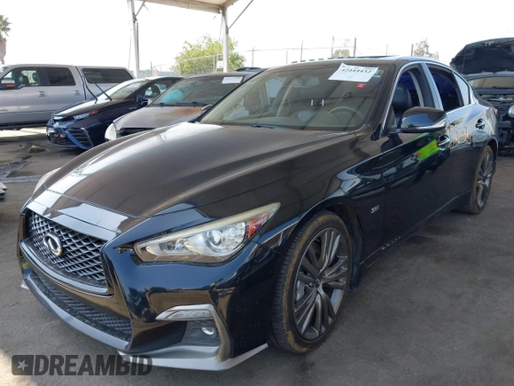2018 Infiniti Q50 Luxe z VIN JN1EV7AP9JM353684, wystawiony jako IAAI lot #42444432 z przebiegiem 85 036 mil mil oraz . Historia ofert i sprzedaży dostępna na DreamBid. Obrazek 2.