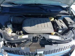 2018 Dodge Grand Caravan SXT with VIN 2C4RDGCG1JR326457, listed as a IAAI auction lot 42047301 with 84,518 mi miles and . Bid and sale history available at DreamBid. Image 10.