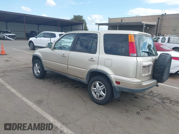 2001 Honda CR-V SE with VIN JHLRD18791C000245, listed as a IAAI auction lot 41910546 with 140,712 mi miles. Bid and sale history available at carsss.com. Image 3.