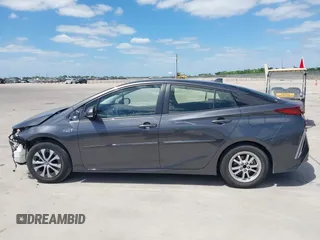 2021 Toyota Prius LE with VIN JTDKAMFP3M3193640, listed as a IAAI auction lot 42023593 with 17,841 mi miles and . Bid and sale history available at DreamBid. Image 15.