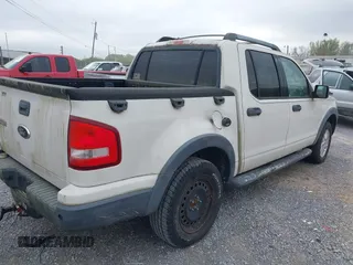 2010 Ford Explorer Sport Trac XLT z VIN 1FMEU3BE3AUA02528, wystawiony jako IAAI lot #41940283 z przebiegiem 96 049 mil mil oraz . Historia ofert i sprzedaży dostępna na DreamBid. Obrazek 4.