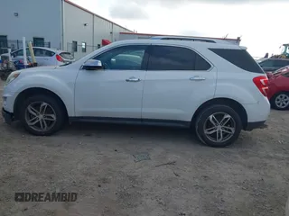 2016 Chevrolet Equinox LTZ z VIN 2GNALDEK5G1160782, wystawiony jako IAAI lot #42575417 z przebiegiem 149 395 mil mil oraz . Historia ofert i sprzedaży dostępna na DreamBid. Obrazek 14.