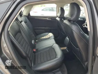 2017 Ford Fusion SE z VIN 3FA6P0H74HR390898, wystawiony jako Copart lot #58958275 z przebiegiem 159 799 mil mil oraz Szkoda całkowita • Salvage title. Historia ofert i sprzedaży dostępna na DreamBid. Obrazek 10.