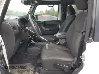 2015 Jeep Wrangler Sport with VIN 1C4AJWAG1FL525429, listed as a Copart auction lot 43033025 with 93,972 mi miles and Salvage title. Bid and sale history available at DreamBid. Image 7.