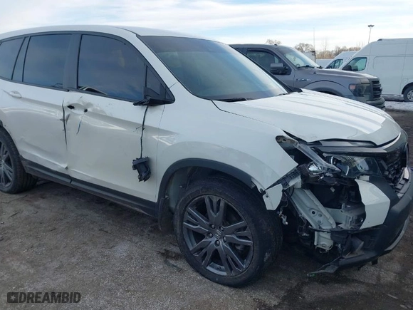 2019 Honda Passport EX-L with VIN 5FNYF8H5XKB008904, listed as a IAAI auction lot 41440706 with 57,317 mi miles. Bid and sale history available at carsss.com. Image 6.