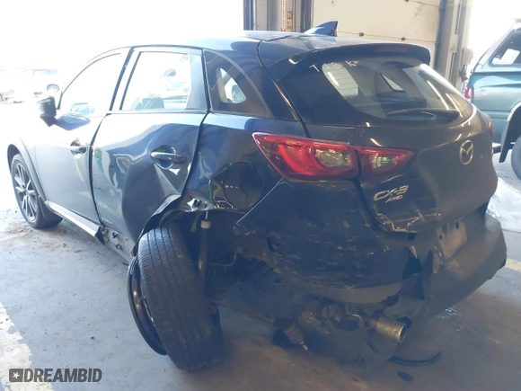 2018 Mazda CX-3 Grand Touring with VIN JM1DKFD77J0300612, listed as a IAAI auction lot 41322923 with 49,830 mi miles. Bid and sale history available at carsss.com. Image 6.