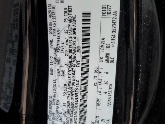 2013 Ford Escape SE with VIN 1FMCU0GXXDUB76102, listed as a Copart auction lot 44226025 with 104,127 mi miles and Salvage Title. Bid and sale history available at DreamBid. Image 14.