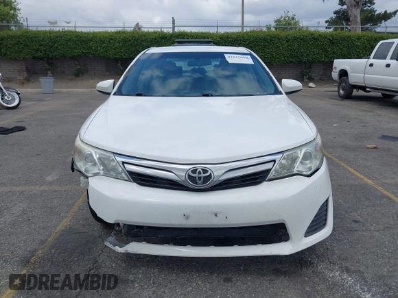 2014 Toyota Camry L with VIN 4T1BF1FK4EU403013, listed as a IAAI auction lot 42115089 with 221,686 mi miles and . Bid and sale history available at DreamBid. Image 12.
