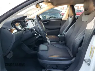 2015 Tesla Model S 85D with VIN 5YJSA1S21FF087461, listed as a Copart auction lot 87027334 with 53,868 mi miles and Salvage Title. Bid and sale history available at carsss.com. Image 7.