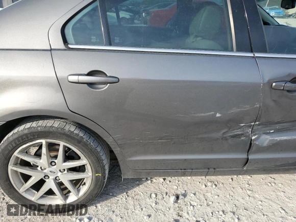 2012 Ford Fusion SEL with VIN 3FAHP0JA2CR241459, listed as a Copart auction lot 51834505 with 201,527 mi miles and Salvage Title. Bid and sale history available at DreamBid. Image 10.