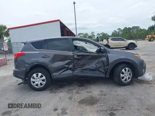 2015 Toyota RAV4 LE with VIN 2T3BFREV7FW303085, listed as a IAAI auction lot 42426856 with 146,485 mi miles and . Bid and sale history available at DreamBid. Image 6.