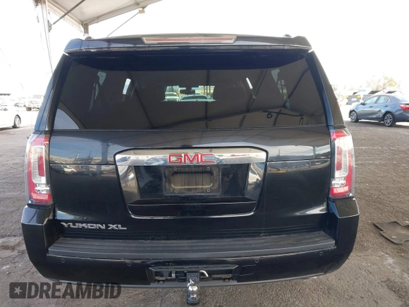 2016 GMC Yukon XL SLE with VIN 1GKS1FKC2GR147222, listed as a IAAI auction lot 41390201 with 86,385 mi miles. Bid and sale history available at carsss.com. Image 16.