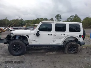 2021 Jeep Wrangler Unlimited Willys with VIN 1C4HJXDN0MW685716, listed as a IAAI auction lot 40837088 with 35,881 mi miles and . Bid and sale history available at DreamBid. Image 6.
