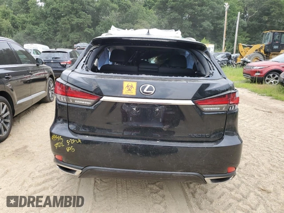 2022 Lexus RX with VIN 2T2HZMDA5NC329272, listed as a Copart auction lot 64598094 with 0 mi miles and Salvage Title. Bid and sale history available at carsss.com. Image 6.