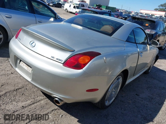 2002 Lexus SC with VIN JTHFN48Y720028912, listed as a IAAI auction lot 41810756 with 80,036 mi miles. Bid and sale history available at carsss.com. Image 4.