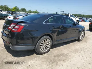 2015 Ford Taurus Limited z VIN 1FAHP2F82FG103711, wystawiony jako Copart lot #57158265 z przebiegiem 205 999 mil mil oraz Szkoda całkowita • Salvage title. Historia ofert i sprzedaży dostępna na DreamBid. Obrazek 3.