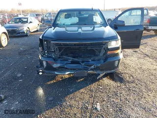 2017 Chevrolet Silverado 1500 LT with VIN 1GCVKREC8HZ331875, listed as a IAAI auction lot 40960777 with 147,157 mi miles. Bid and sale history available at carsss.com. Image 5.