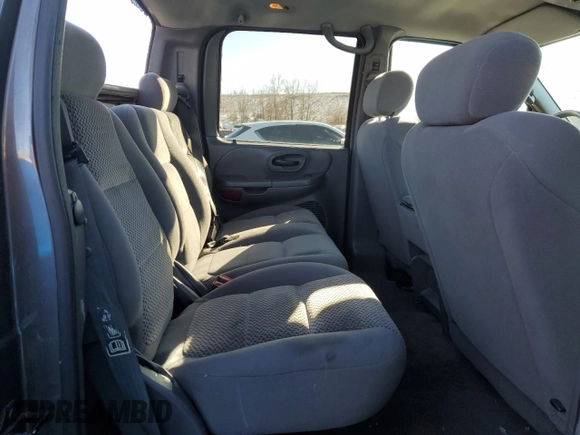 2003 Ford F-150 XLT with VIN 1FTRW08673KA38056, listed as a Copart auction lot 42772435 with 129,104 mi miles and Salvage Title. Bid and sale history available at carsss.com. Image 10.