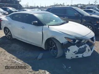 2016 Nissan Maxima SR z VIN 1N4AA6AP6GC446457, wystawiony jako IAAI lot #41779837 z przebiegiem 144 051 mil mil oraz . Historia ofert i sprzedaży dostępna na DreamBid. Obrazek 1.