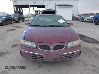 2001 Pontiac Bonneville SE z VIN 1G2HX54K914293726, wystawiony jako IAAI lot #41373612 z przebiegiem 120 117 mil mil oraz . Historia ofert i sprzedaży dostępna na DreamBid. Obrazek 6.
