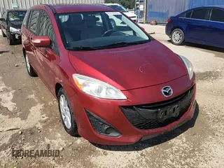 2014 Mazda 5 Sport z VIN JM1CW2BL5E0163569, wystawiony jako Copart lot #65799235 z przebiegiem 234 139 mil mil oraz Nie do naprawy • Non repairable. Historia ofert i sprzedaży dostępna na DreamBid. Obrazek 14.