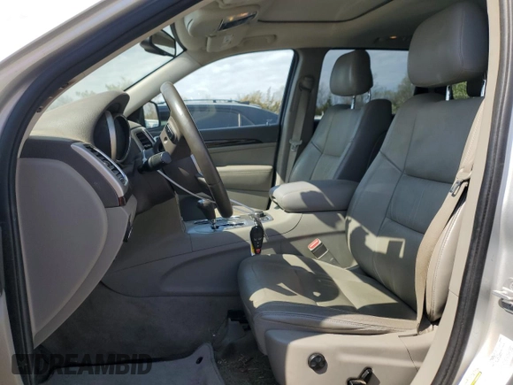 2012 Jeep Grand Cherokee Laredo with VIN 1C4RJFAG4CC123354, listed as a Copart auction lot 52711295 with 151,004 mi miles and Salvage Title. Bid and sale history available at carsss.com. Image 7.